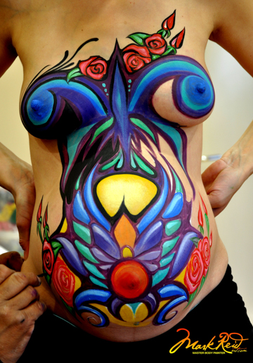 fun and colorful painting of the belly of a pregnant woman